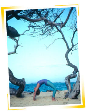 photo of Karin in backbend on the beach