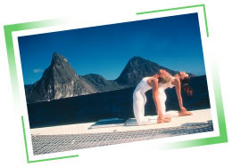photo of Karin and another teacher in camel pose