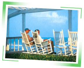 photo of participants in rocking chairs on veranda